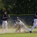 Huron Nasheed Bass after sliding into second during a game against Pioneer on Monday, May 13. Daniel Brenner I AnnArbor.com